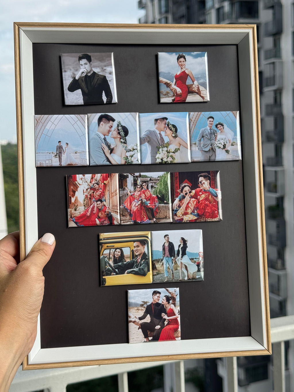 Valentine's Day arranged in a heart shape Collage of photos in a framed display with a person holding it.